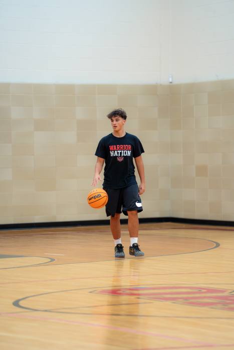 Player bringing the ball up the court